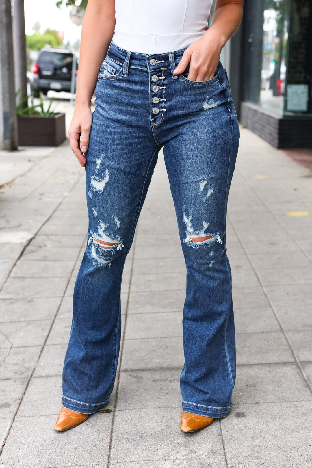 Mid-Rise Button-Fly Distressed Flare Jeans